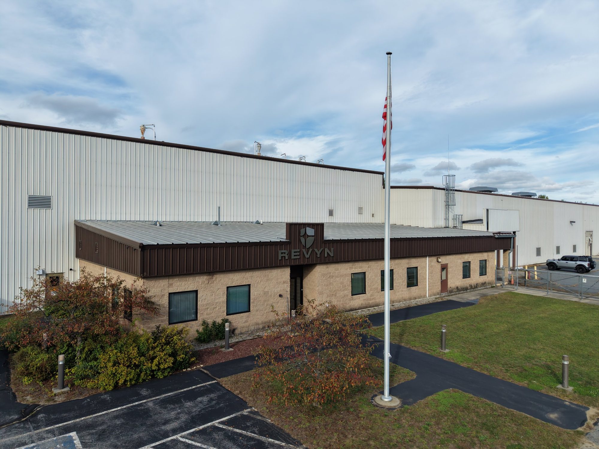 The Revyn factory in North Springfield, Vermont, with the American flag flying out front